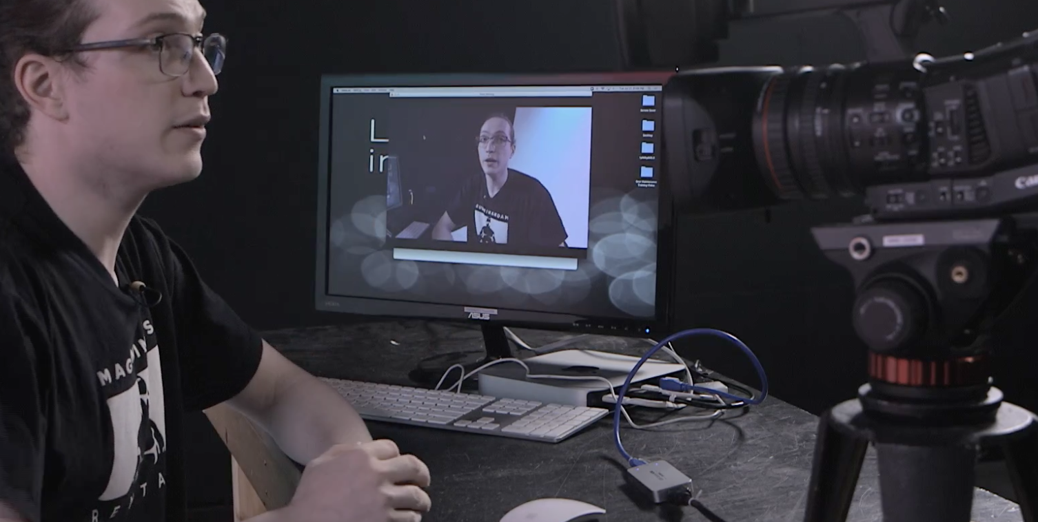 Mike connects a camera to a Zoom meeting with the Magewell Dongle.